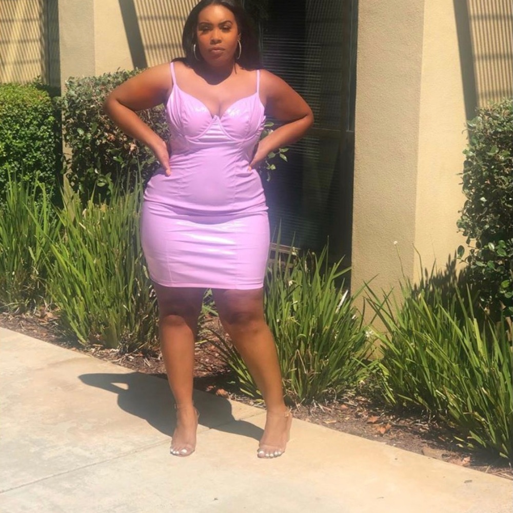 Pink vinyl dress.
